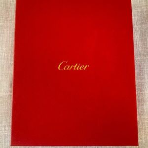 Cartier portfolio case with luxurious postcards and envelopes.